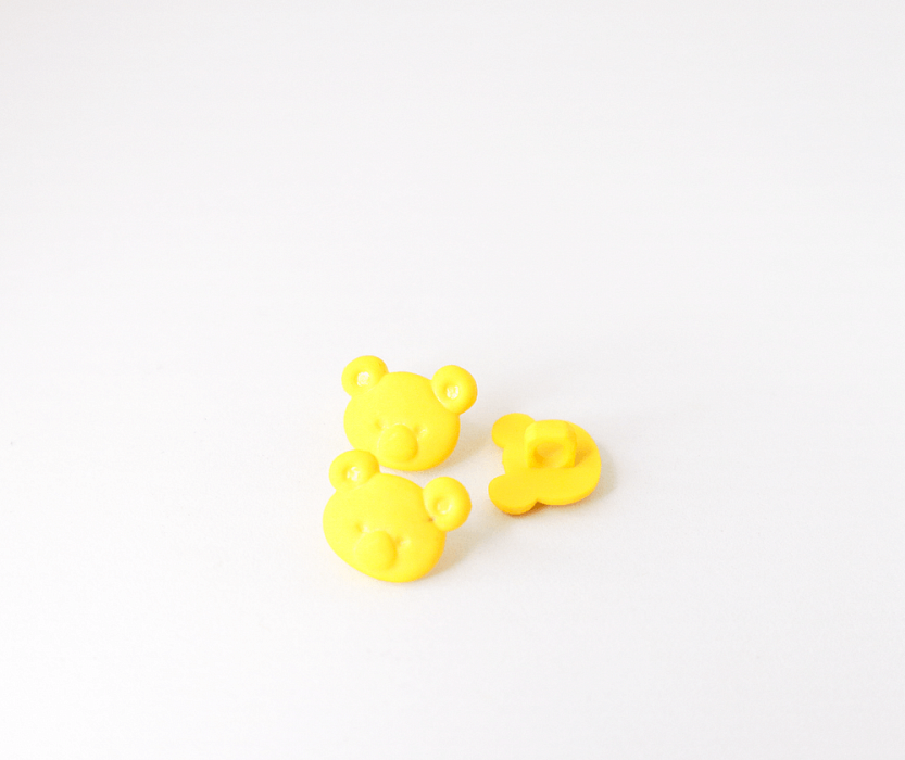 Пуговица детская Мишка пластиковая на ножке желтый 15 мм