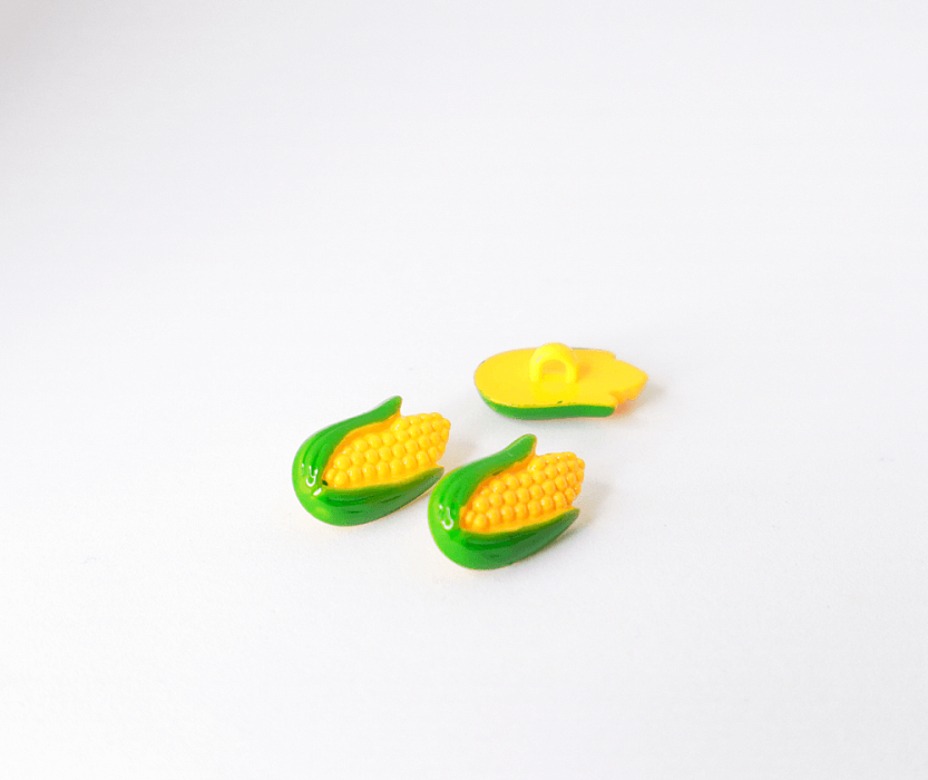 Пуговица детская Кукуруза пластиковая на ножке желтый 18 мм